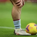 Why does Jack Grealish wear his socks low?