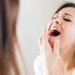 What’s the Cause of That Dark Spot on Your Tooth?