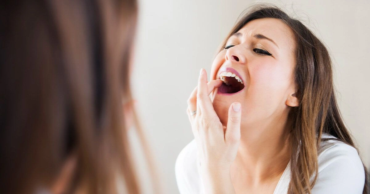 What’s the Cause of That Dark Spot on Your Tooth?