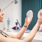 What Problems Are Possible with Breast Implants Placed Under the Muscle?
