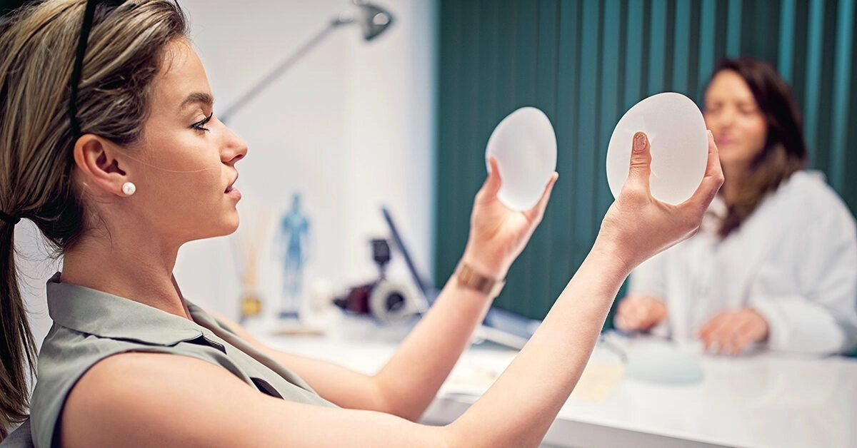 What Problems Are Possible with Breast Implants Placed Under the Muscle?